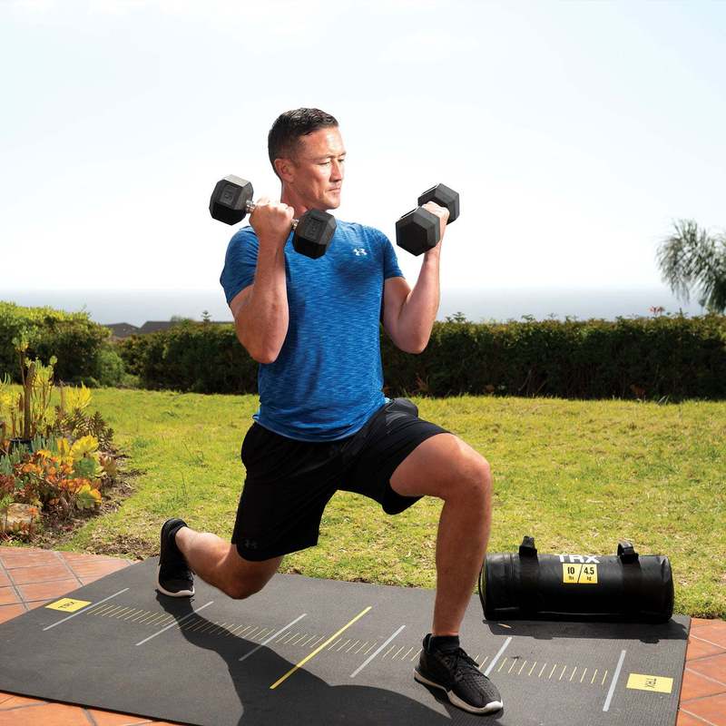 Pair of SmartVoro 10 lb rubber hex dumbbells side view — floor-safe non-roll design